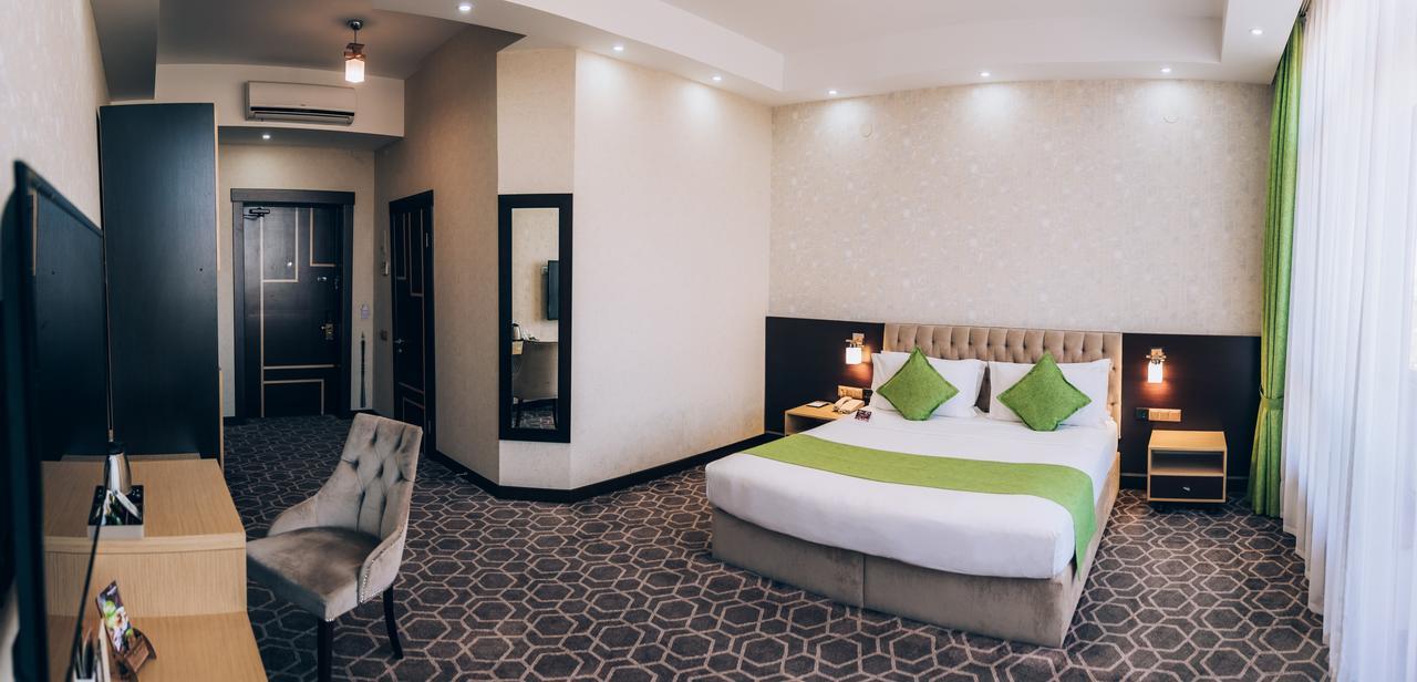 Megapolis Hotel シムケント エクステリア 写真