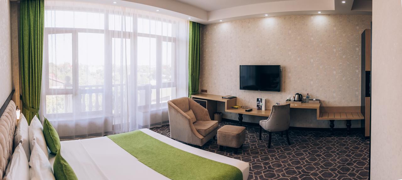Megapolis Hotel シムケント エクステリア 写真